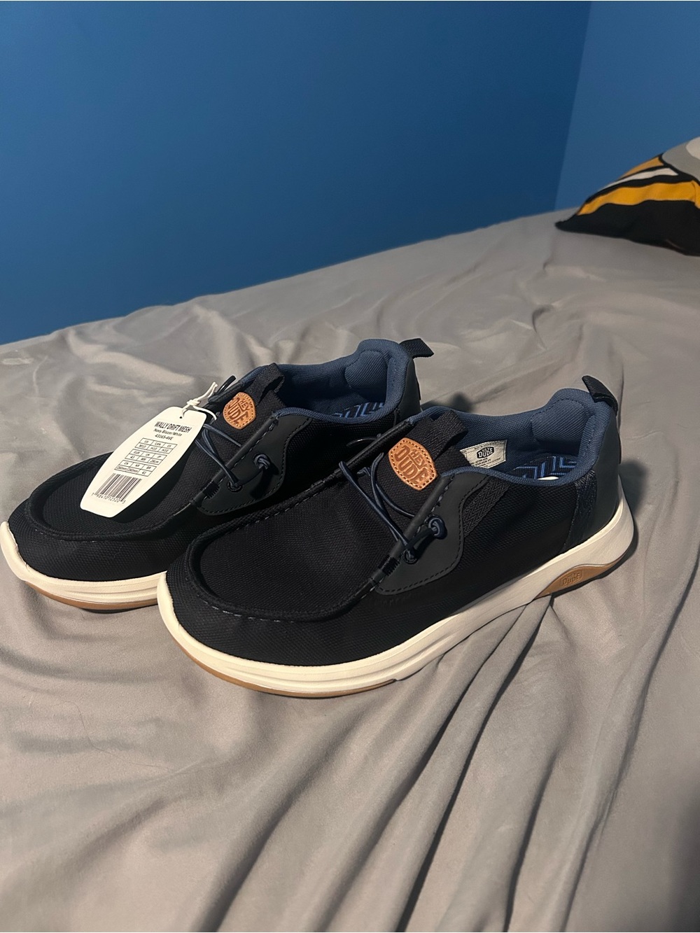 Hey Dude Navy and Tan Slip-On Sneakers